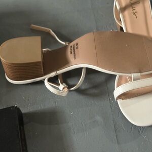 Brand new White Strap shoes